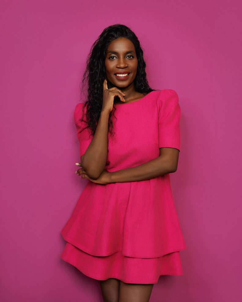 Sadia De Kiden, keynote speaker from Munich, in a pink dress
